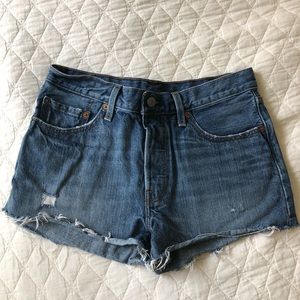 Levi’s size 28 mid rise distressed jean shorts
